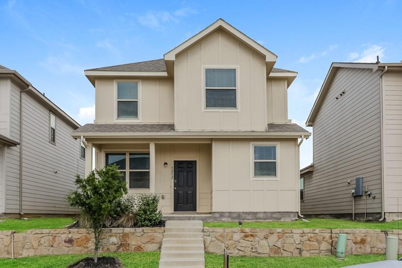 5212 Applegate Drive Fort Worth, TX 76119 - Photo 1 of 1 a front view of a house with garden