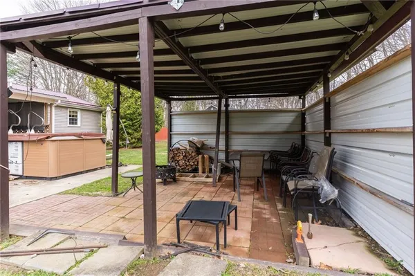 a kitchen with stainless steel appliances granite countertop a refrigerator stove and microwave