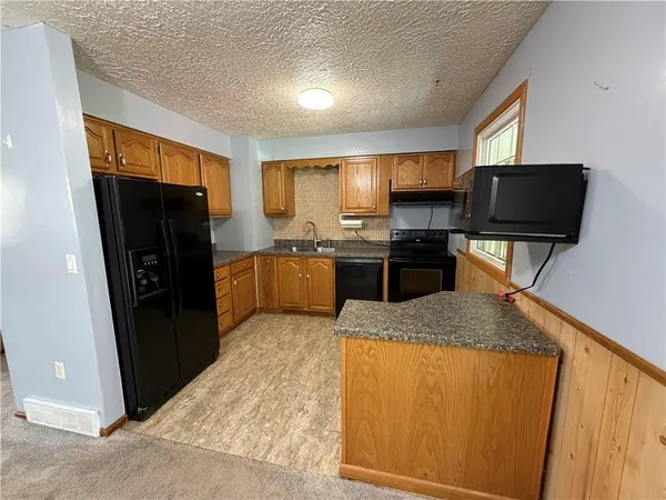 an empty room with closet area