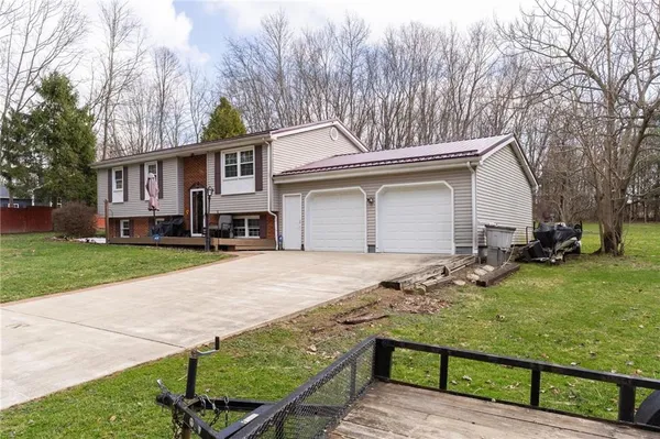 a house view with a backyard space