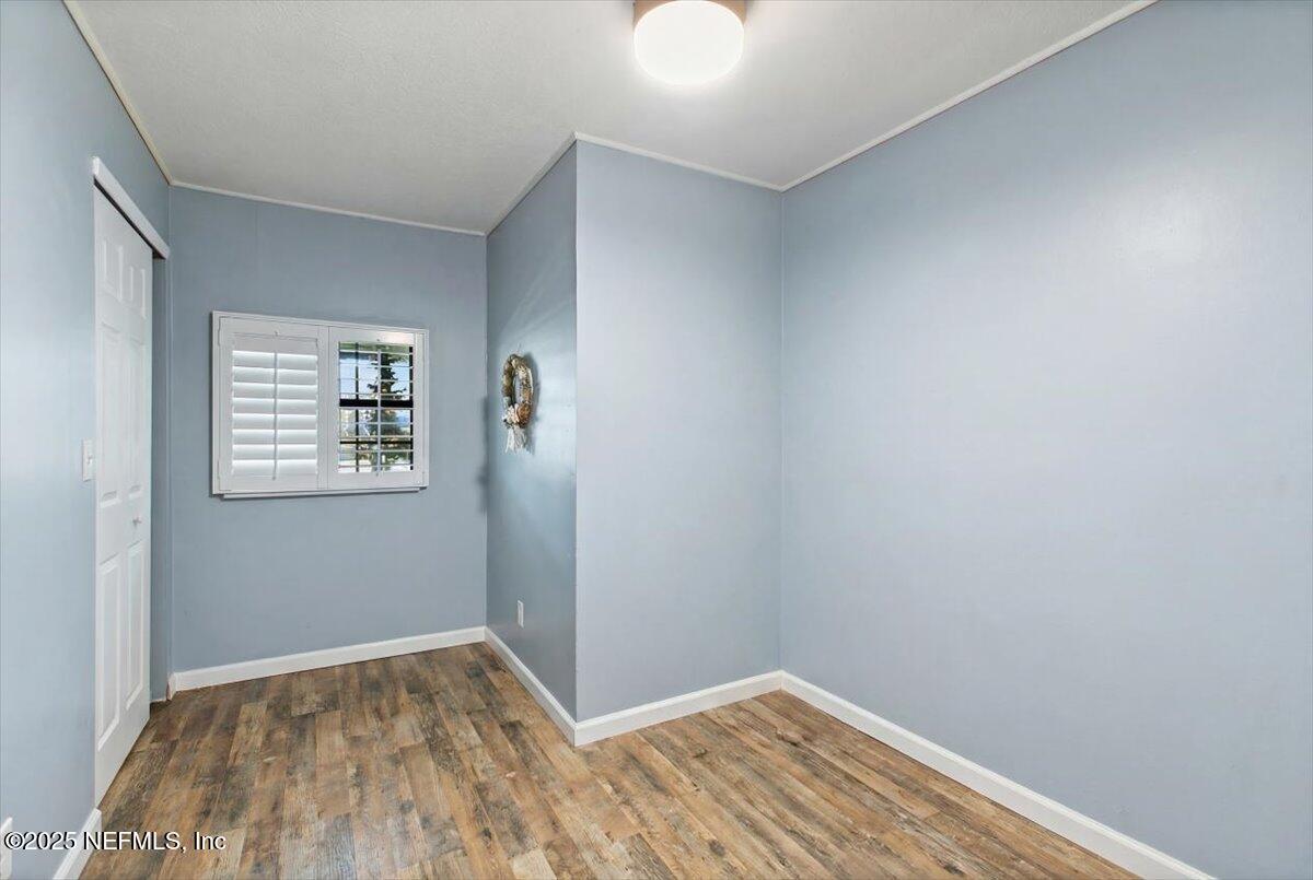 45077 Clemmons Road Callahan, FL 32011 - Photo 13 of 20 a view of room with wooden floor