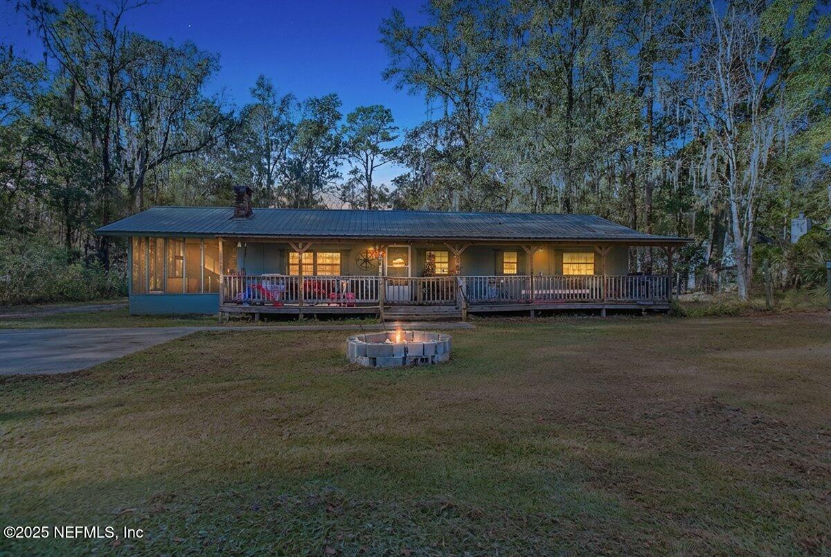 45077 Clemmons Road Callahan, FL 32011 - Photo 20 of 20 a front view of a house with swimming pool
