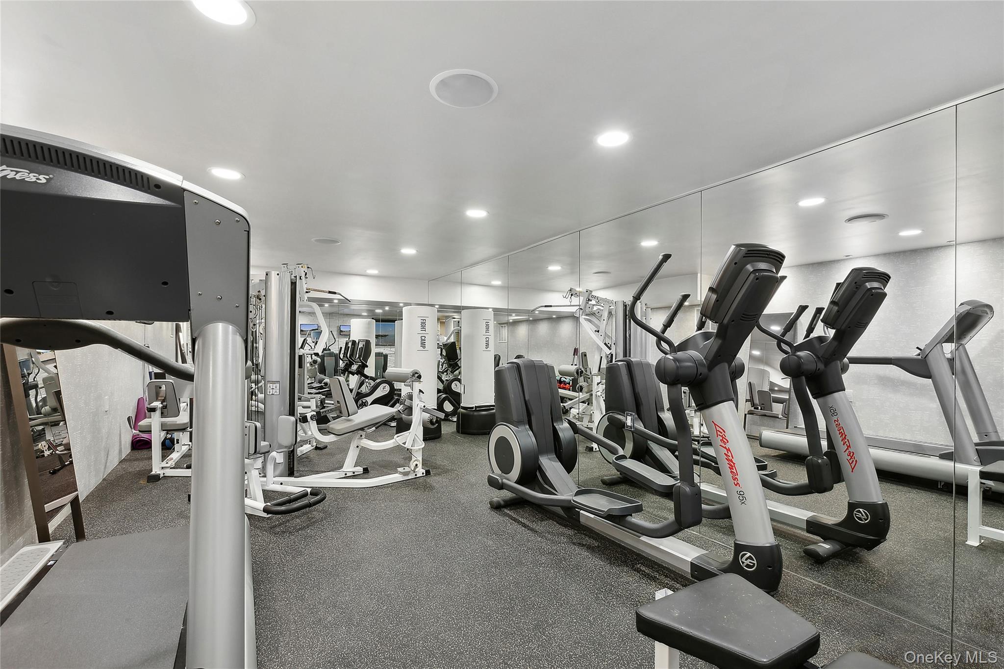 91 Crescent Beach Road Glen Cove, NY 11542 - Photo 33 of 38 a view of a room with gym equipment