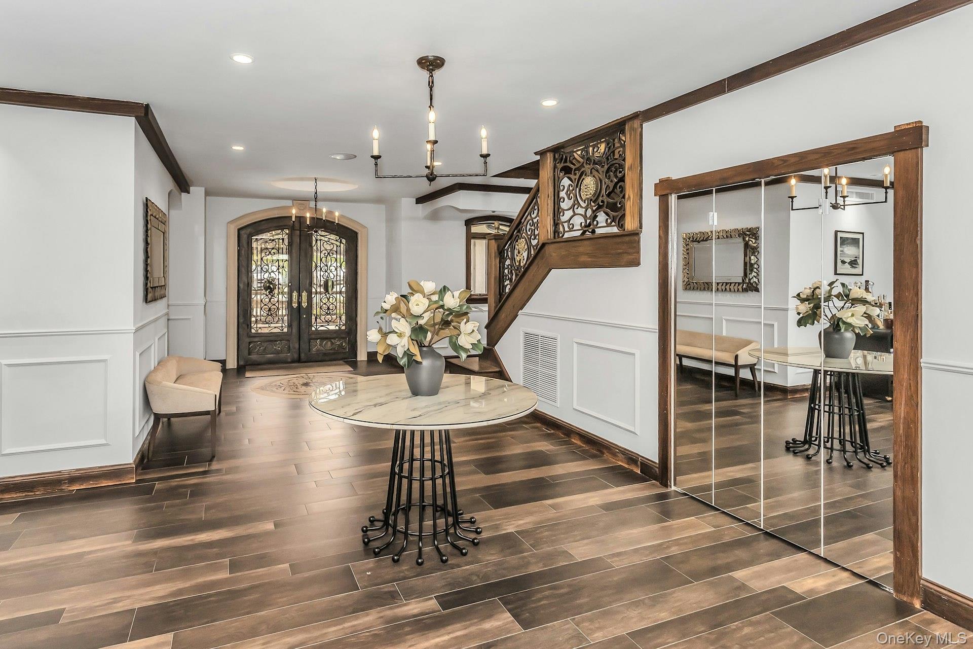 91 Crescent Beach Road Glen Cove, NY 11542 - Photo 7 of 38 a lobby with furniture and wooden floor