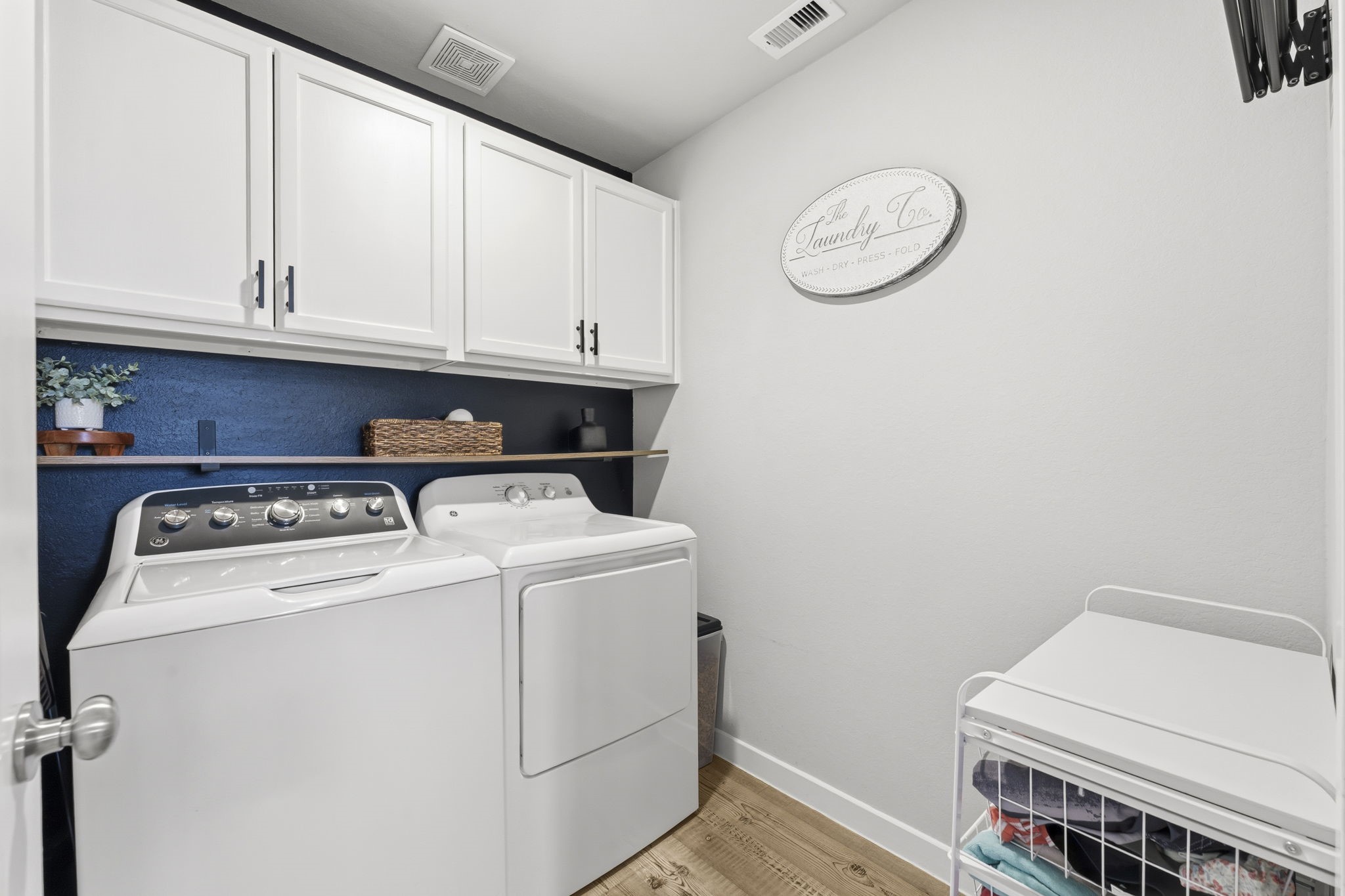 17696 Tree Of Heaven Conroe, TX 77385 - Photo 23 of 32 Plenty of storage in the laundry room that is conveniently located near the bedrooms.
