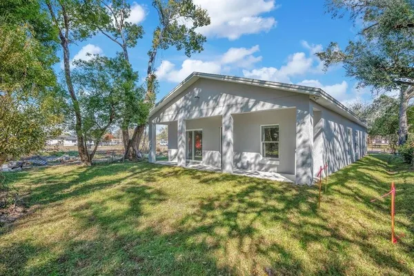 a view of a house with a big yard