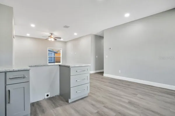 a view of a livingroom with wooden floor