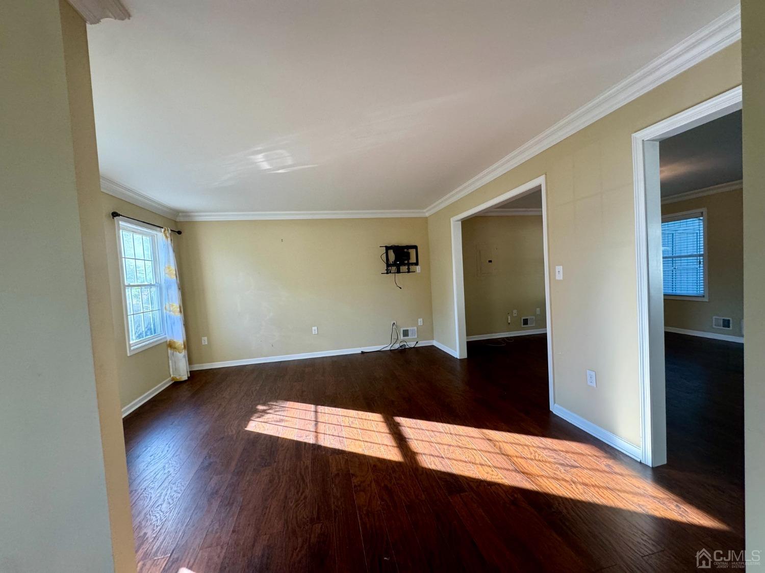 14 Baxter Road Edison, NJ 08817 - Photo 11 of 16 a view of empty room with wooden floor and fan