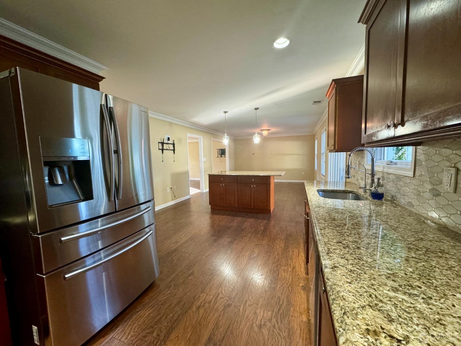 14 Baxter Road Edison, NJ 08817 - Photo 7 of 16 a kitchen with stainless steel appliances granite countertop a refrigerator a stove and a sink