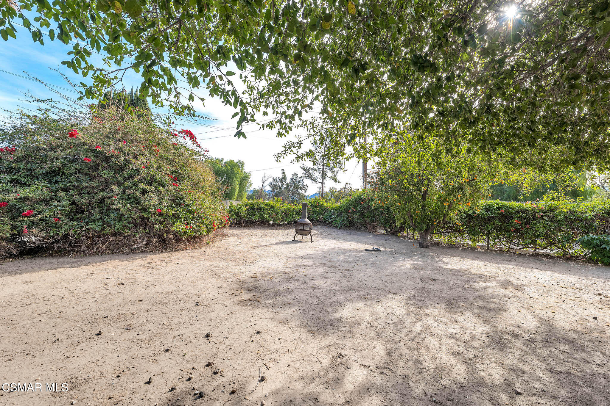 3063 Ditch Road Simi Valley, CA 93063 - Photo 40 of 49 a view of a field with plants and trees