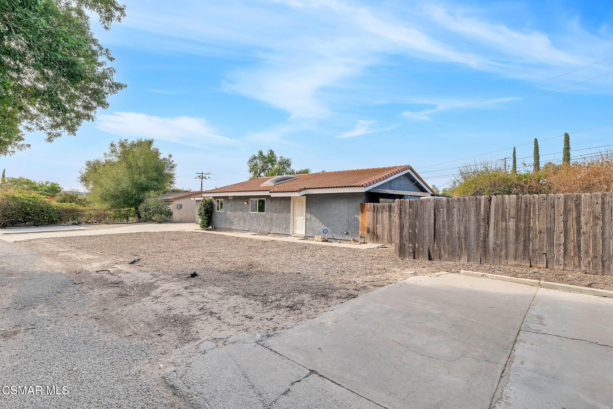 3063 Ditch Road Simi Valley, CA 93063 - Photo 47 of 49 a view of a house with a yard and wooden fence