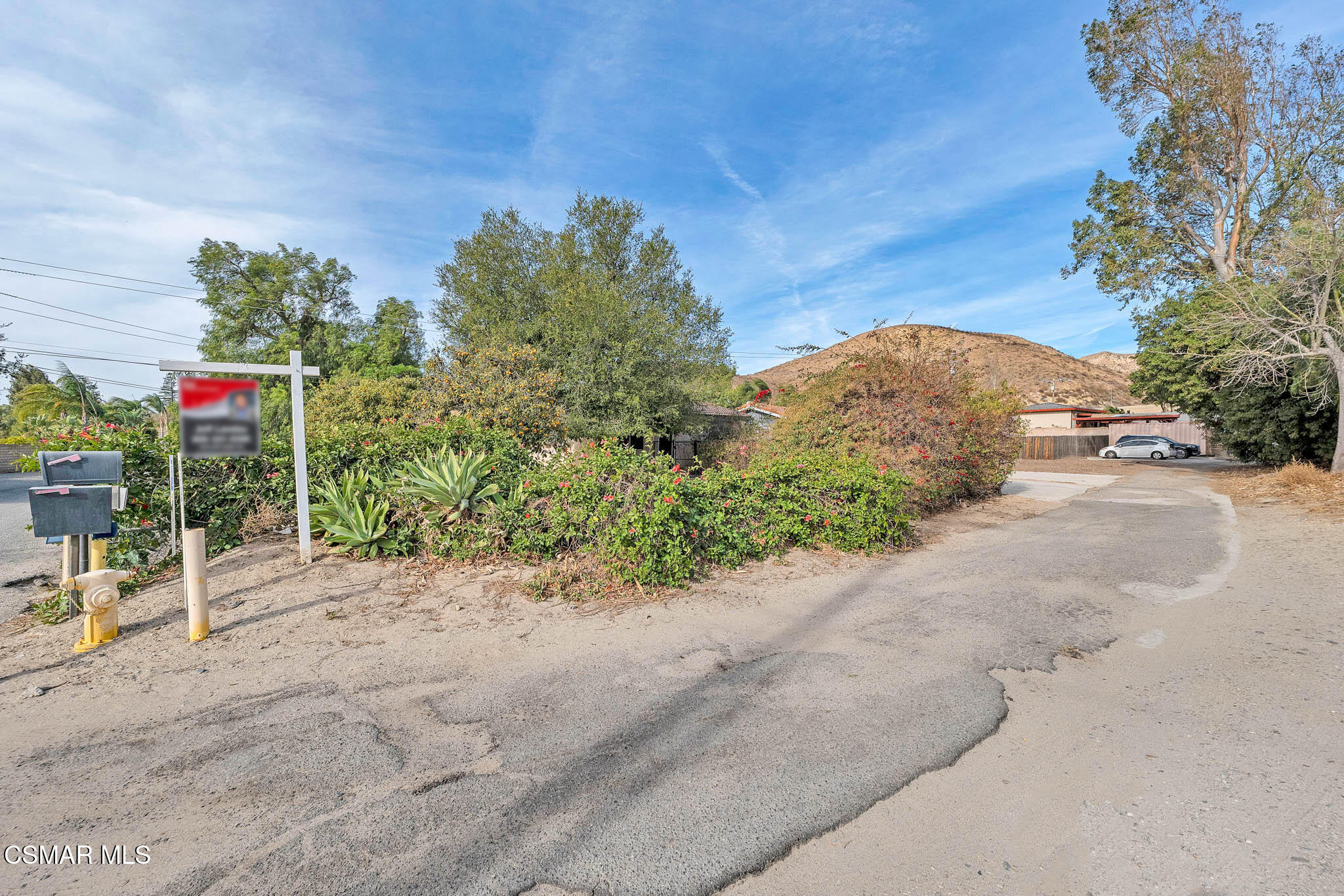 3063 Ditch Road Simi Valley, CA 93063 - Photo 49 of 49 a view of a street with a bench in front of it