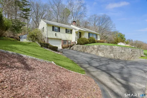 a view of a yard in front of house