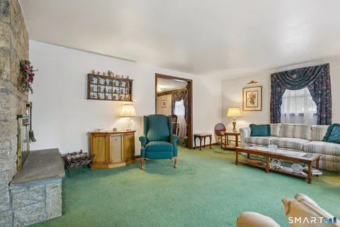 a living room with furniture and a couch