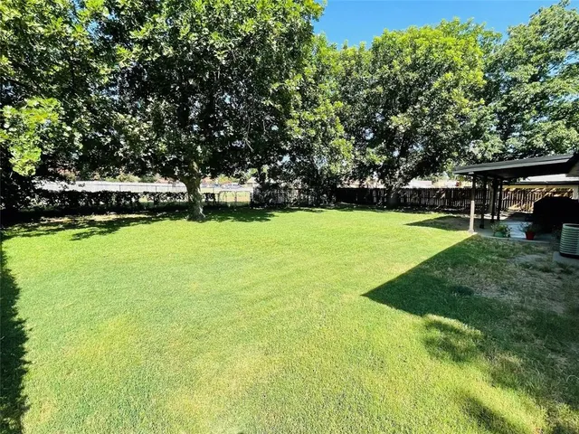 a front view of a house with swimming pool