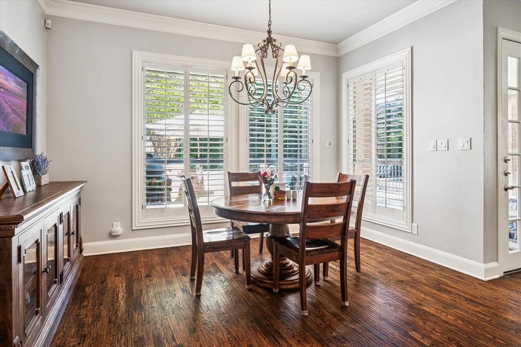 6511 Aberdeen Avenue Dallas, TX 75230 - Photo 17 of 40 a view of a dining room with furniture window and wooden floor