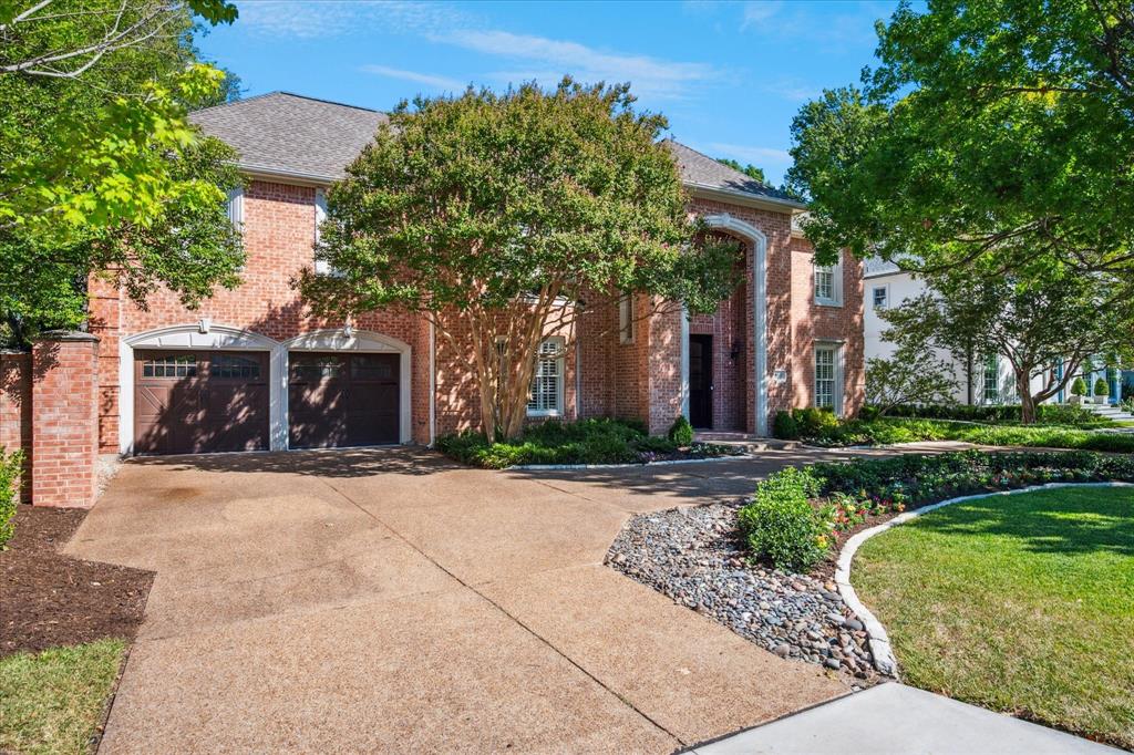 6511 Aberdeen Avenue Dallas, TX 75230 - Photo 2 of 40 front view of a house with a yard