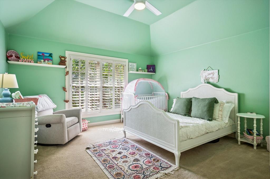 6511 Aberdeen Avenue Dallas, TX 75230 - Photo 31 of 40 a bed room with a bed and a window