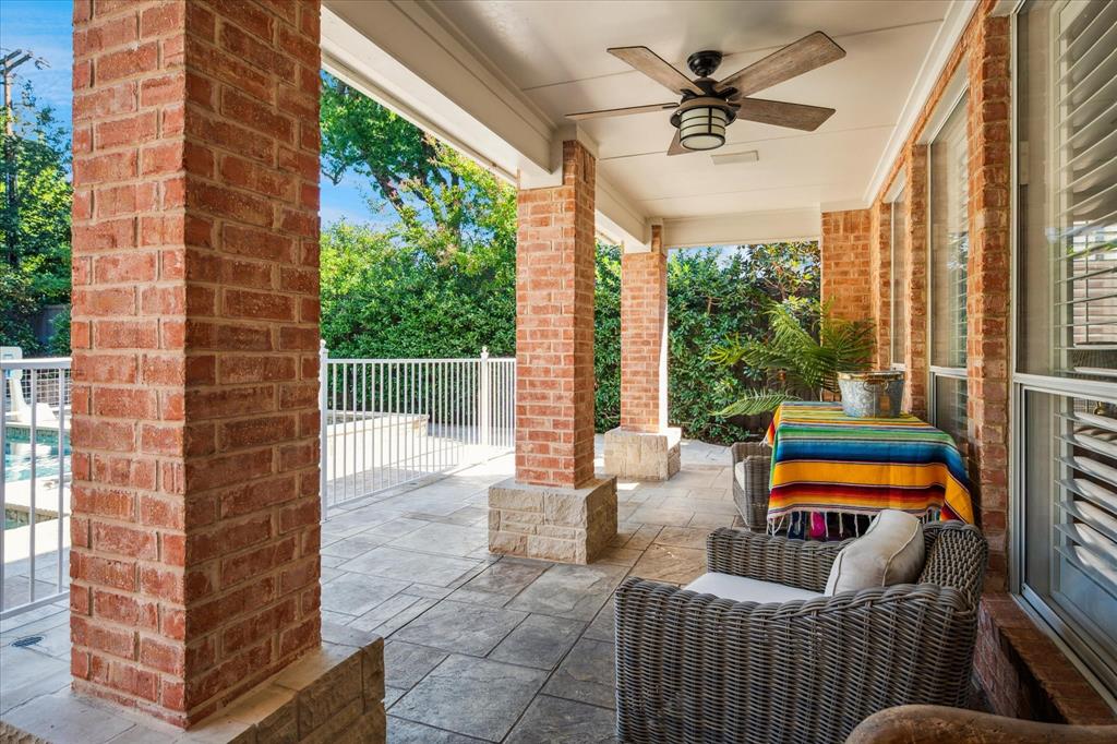 6511 Aberdeen Avenue Dallas, TX 75230 - Photo 34 of 40 a outdoor space with patio the couches and a dining table with garden view