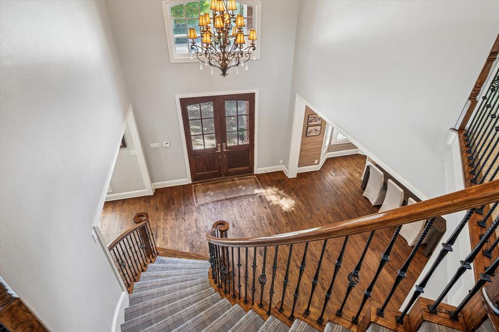 6511 Aberdeen Avenue Dallas, TX 75230 - Photo 5 of 40 a view of entryway with wooden floor