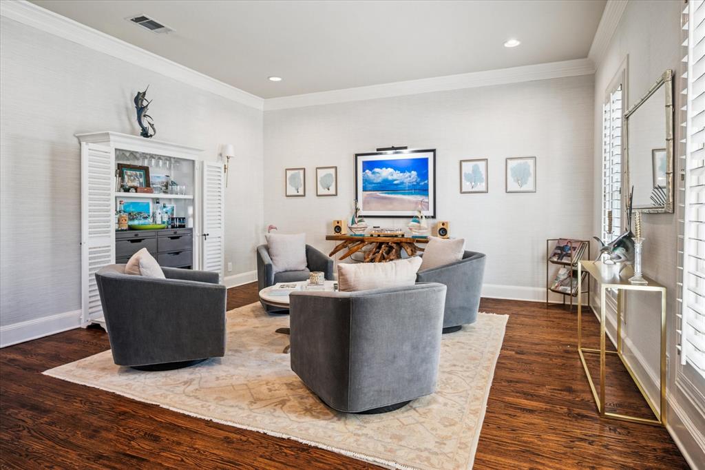6511 Aberdeen Avenue Dallas, TX 75230 - Photo 6 of 40 a living room with furniture and a rug