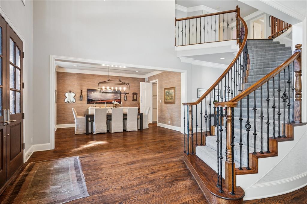 6511 Aberdeen Avenue Dallas, TX 75230 - Photo 7 of 40 a view of entryway and hall with wooden floor