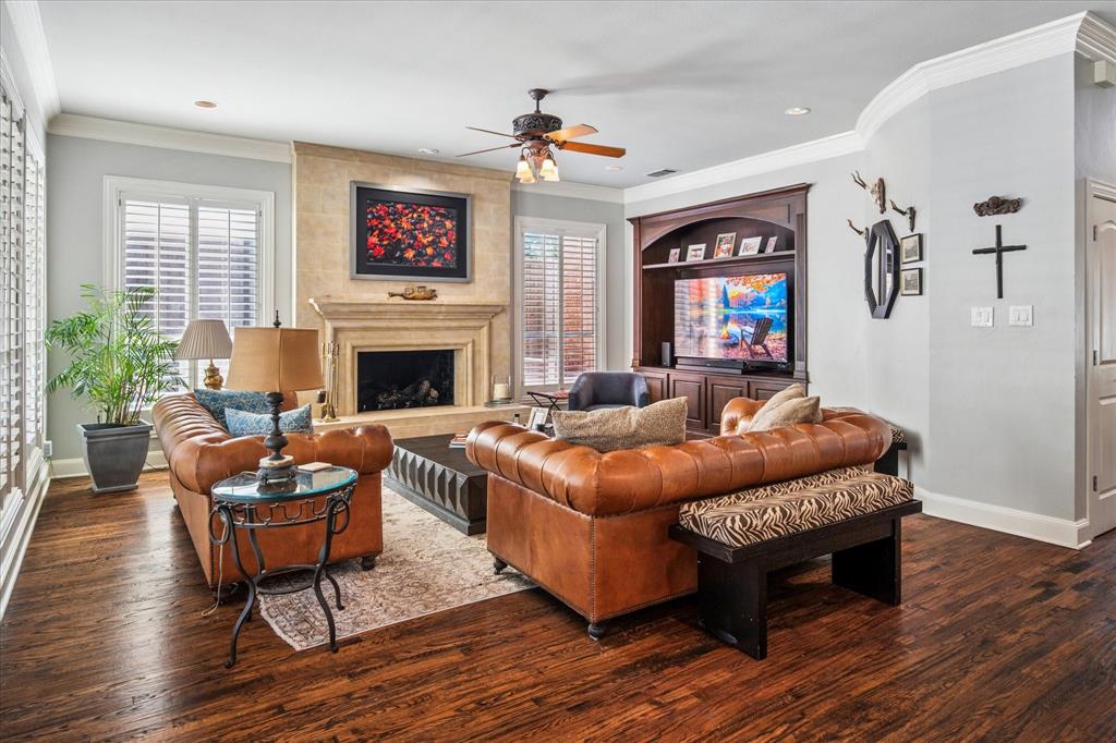 6511 Aberdeen Avenue Dallas, TX 75230 - Photo 10 of 40 a living room with furniture and a fireplace