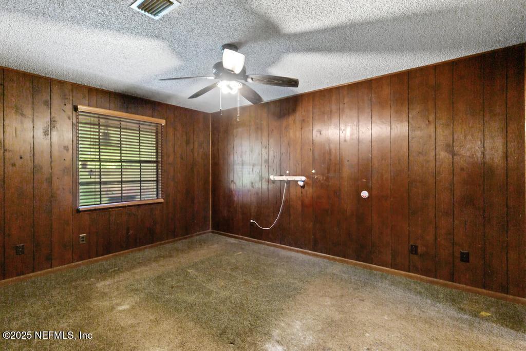 5342 Hickson Road Jacksonville, FL 32207 - Photo 12 of 19 a view of an empty room with a window