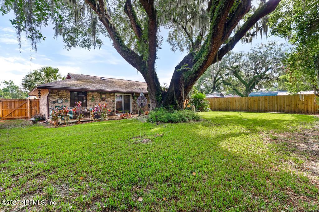 5342 Hickson Road Jacksonville, FL 32207 - Photo 18 of 19 a view of outdoor space yard and patio