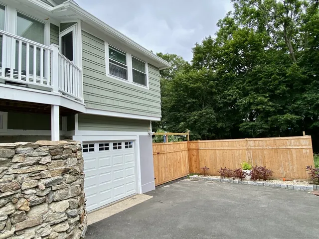 front view of a house with a street