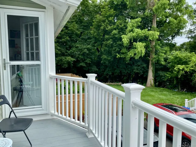 a view of a porch with a yard