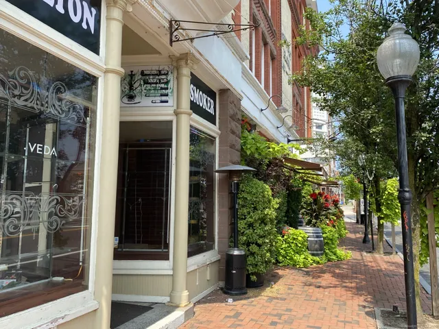 a front view of a building with garden