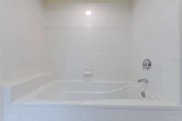 a bathroom with bathtub