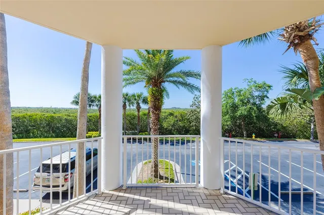 a view of balcony with small garden