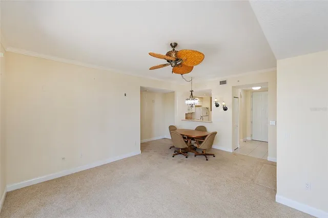 a view of a room with a hanging chair