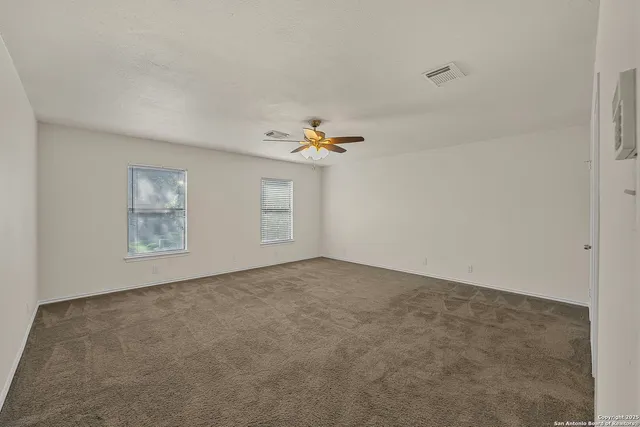 a view of a room with a window