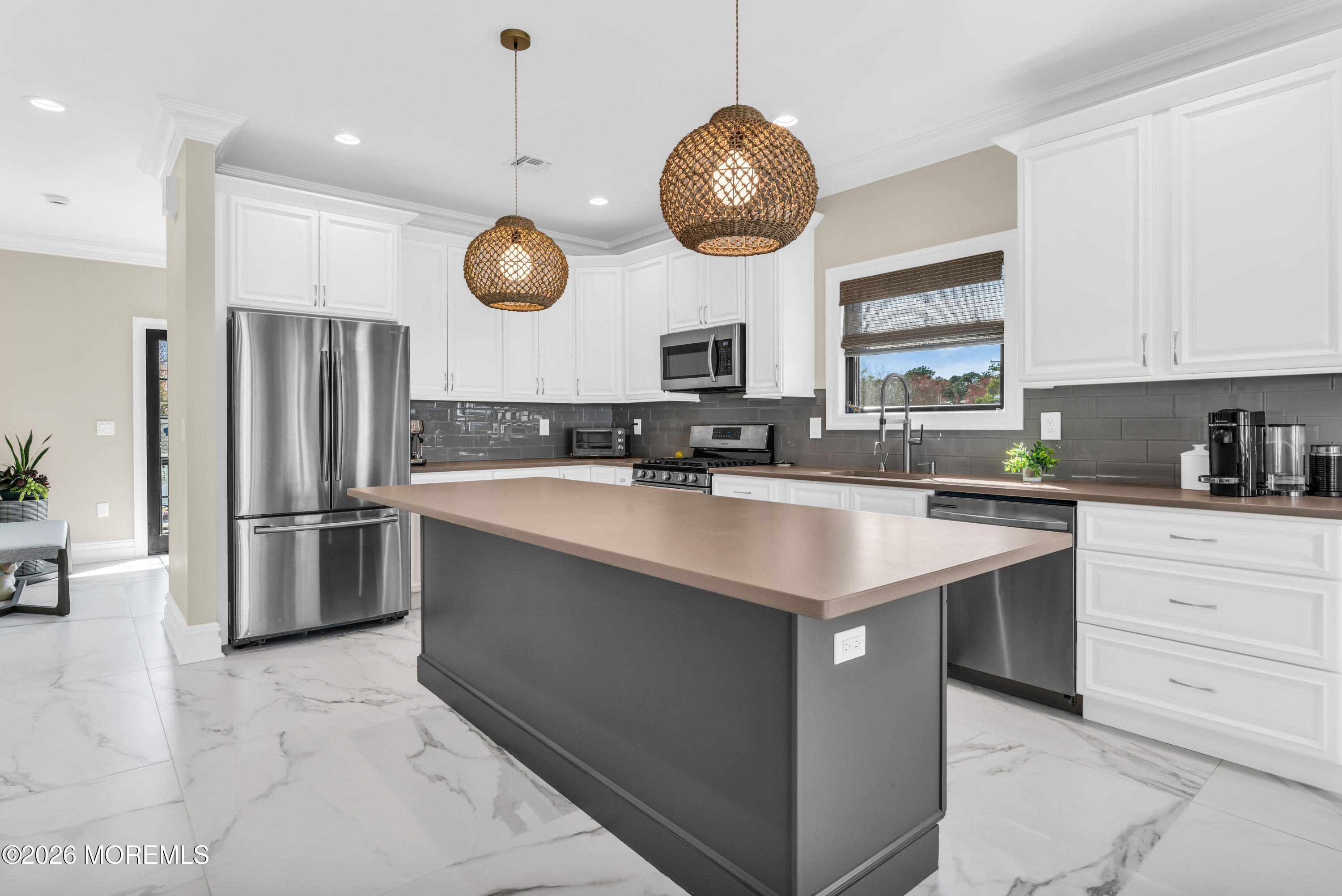 57 Club House Road Brick, NJ 08723 - Photo 11 of 45 a kitchen with stainless steel appliances granite countertop a sink a stove and refrigerator