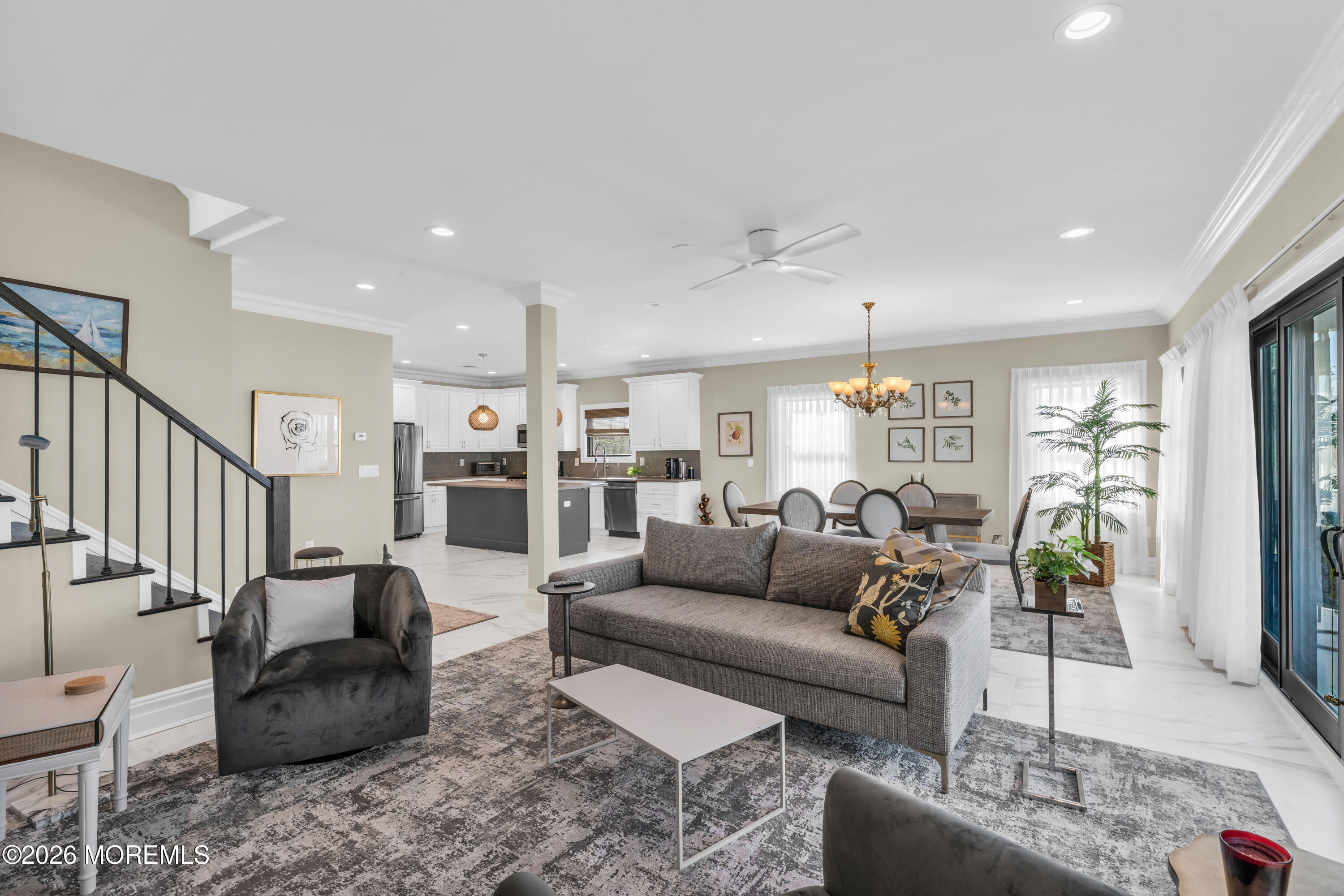 57 Club House Road Brick, NJ 08723 - Photo 16 of 45 a living room with furniture and a chandelier