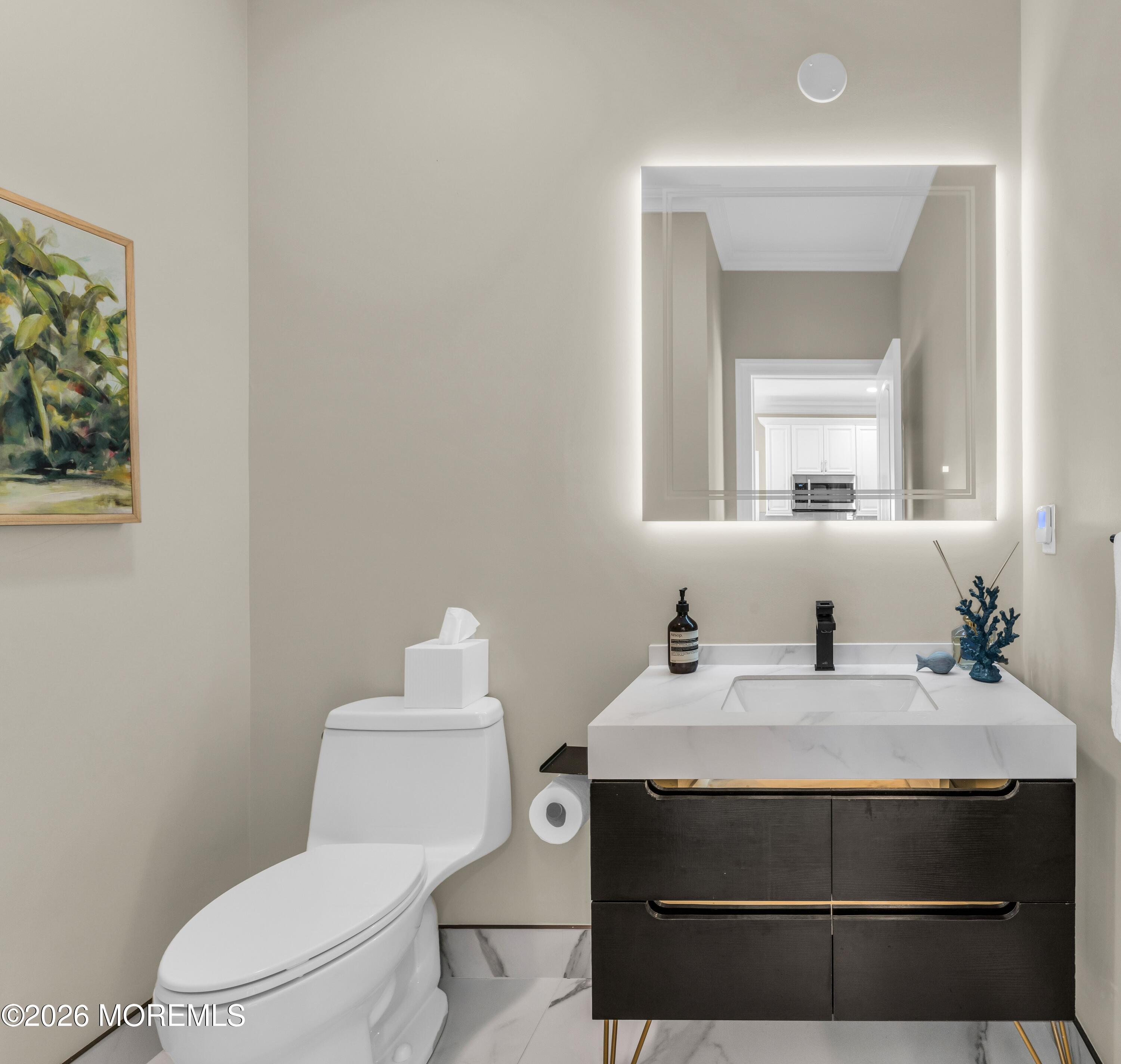 57 Club House Road Brick, NJ 08723 - Photo 9 of 45 a bathroom with a sink toilet and mirror