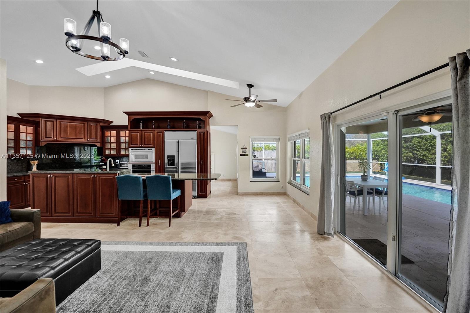 22190 Appleton Drive Boca Raton, FL 33428 - Photo 11 of 41 a living room with furniture and a table