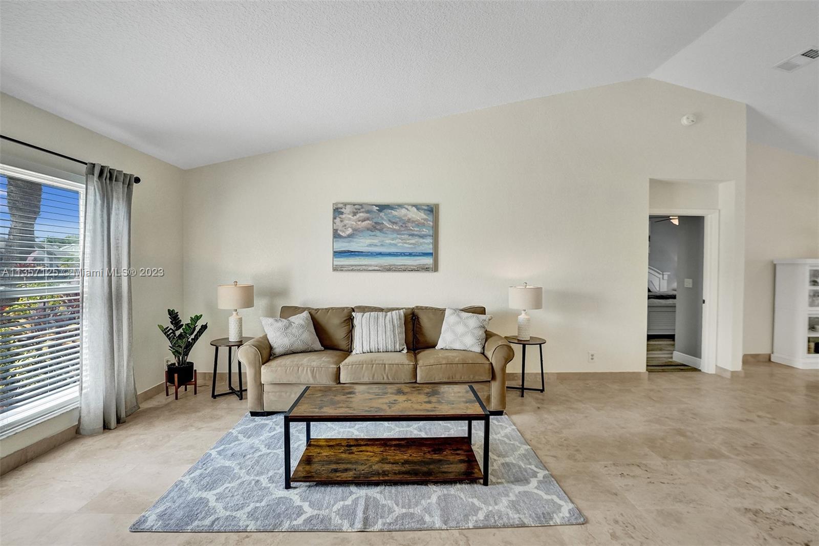 22190 Appleton Drive Boca Raton, FL 33428 - Photo 13 of 41 a living room with furniture and a window