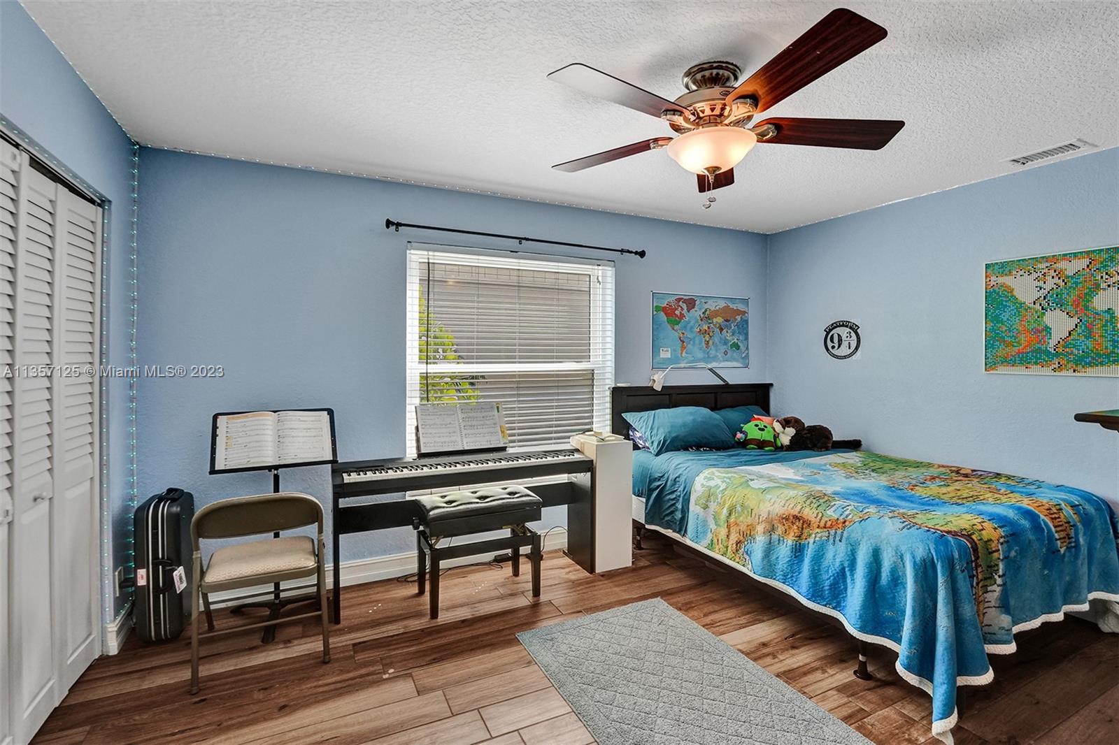 22190 Appleton Drive Boca Raton, FL 33428 - Photo 19 of 41 a bedroom with a bed and a table