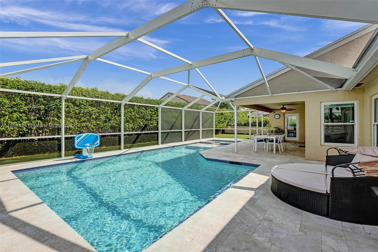 22190 Appleton Drive Boca Raton, FL 33428 - Photo 32 of 41 a view of a backyard with sitting area and tub