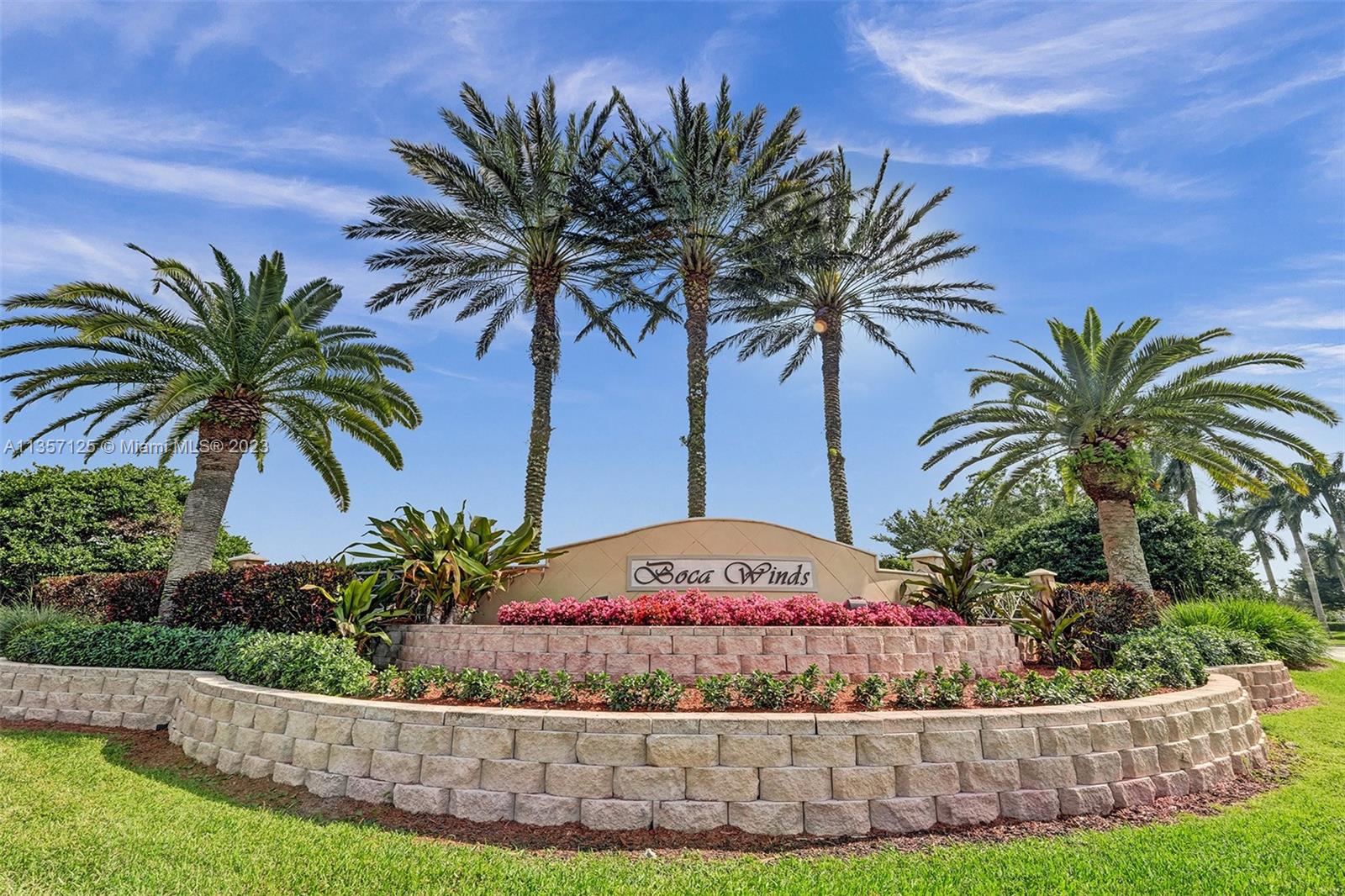 22190 Appleton Drive Boca Raton, FL 33428 - Photo 41 of 41 a front view of a house with a garden