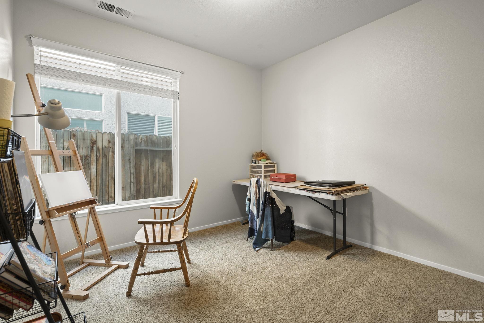 1465 Cayuse Way Reno, NV 89521 - Photo 18 of 26 a view of a room with furniture window and outside view