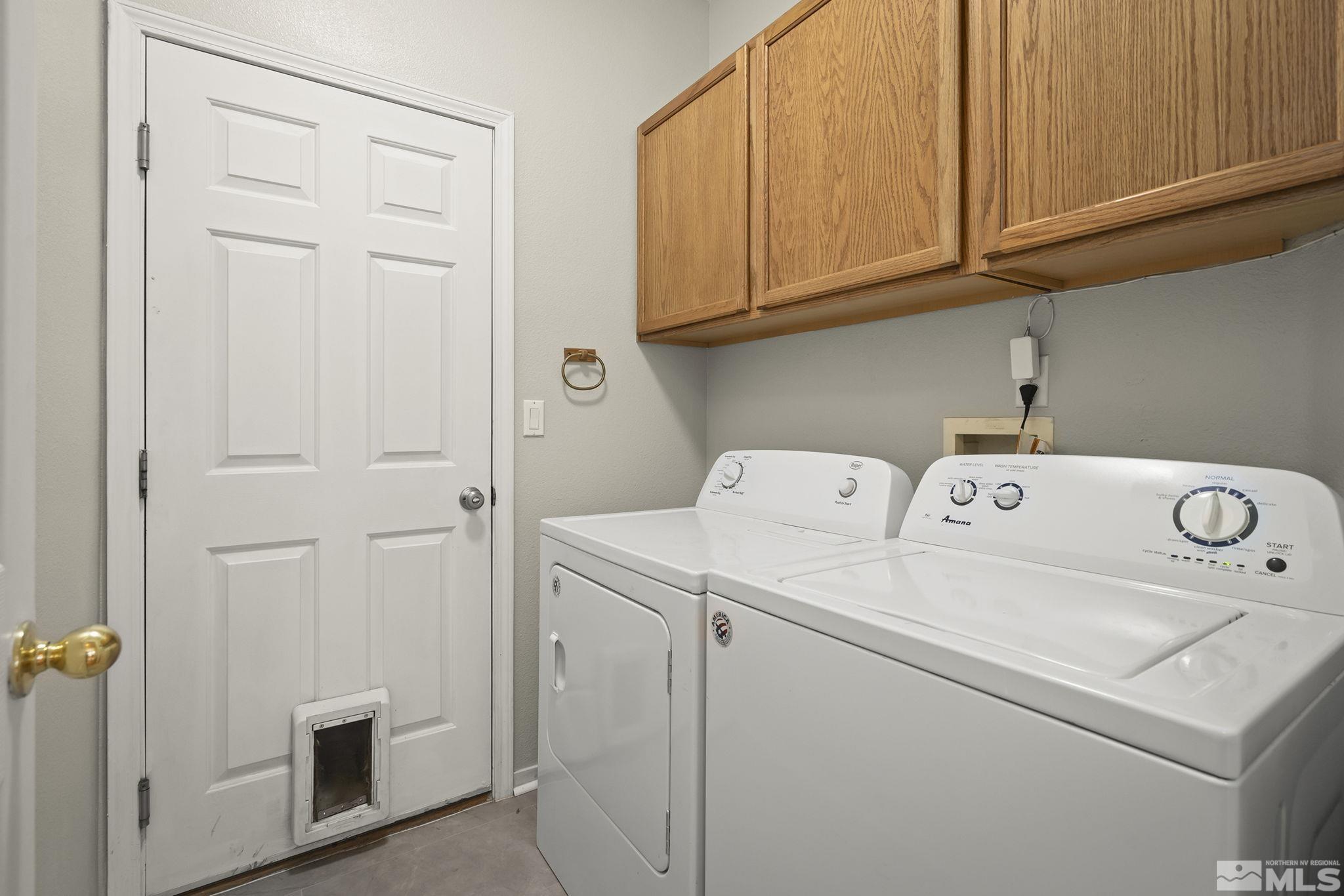 1465 Cayuse Way Reno, NV 89521 - Photo 19 of 26 a utility room with dryer and washer