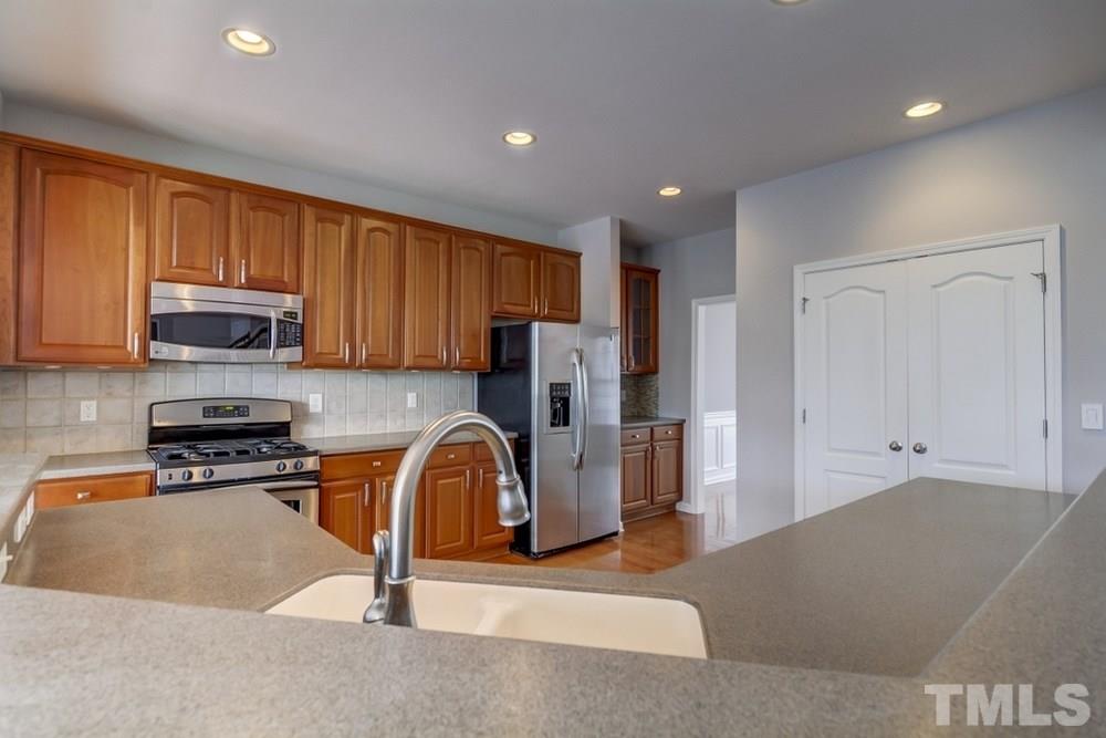 8128 Sommerwell Street Raleigh, NC 27613 - Photo 6 of 25 Gallery Image 6