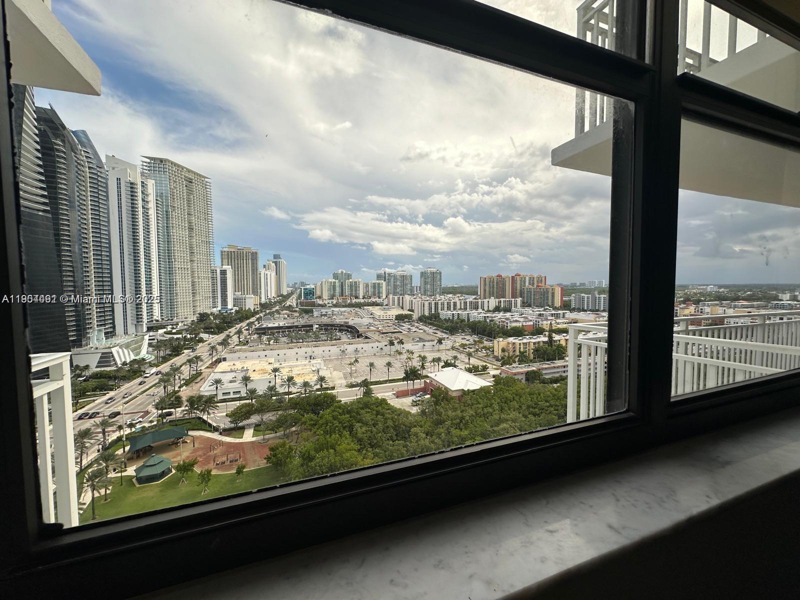 210 174th Street, Unit 2202 Sunny Isles Beach, FL 33160 - Photo 2 of 12 a view of a city from a window