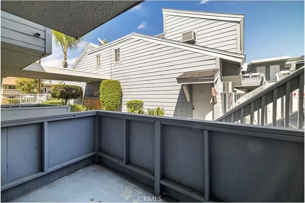 a house view with a outdoor space