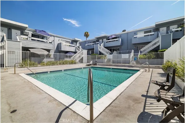 a view of a house with swimming pool